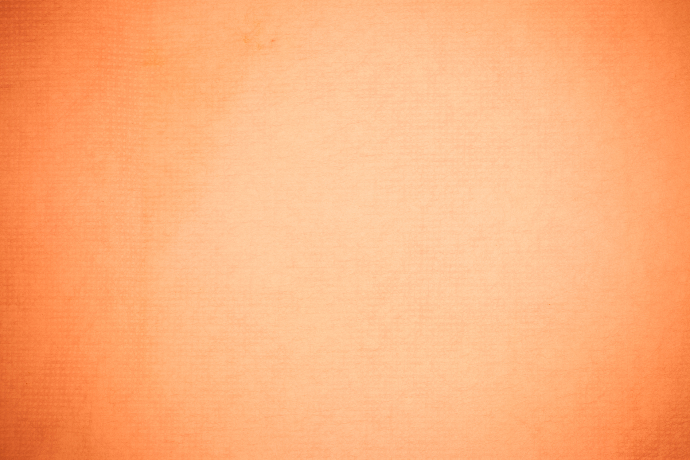 Textured recycling paper orange background.